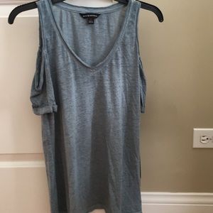 Short sleeve woman’s open shoulder shirt